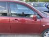 Suzuki Liana ER Bj.01 Tür vorn rechts roh Beifahrertür weinrotmet.